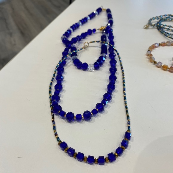 Blue and clear Maa Design crystal necklace - Picture 3 of 3